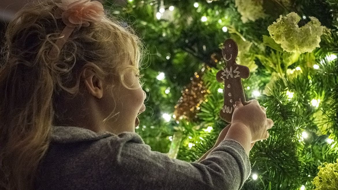 little girl and a christmas tree at Omni Grove Park Inn